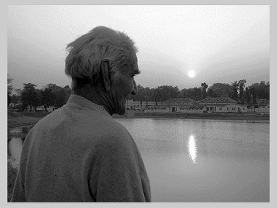 Baba with sunrise in anandwan